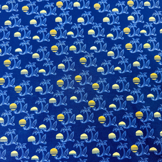 Pattern of palm trees and suns on a blue background