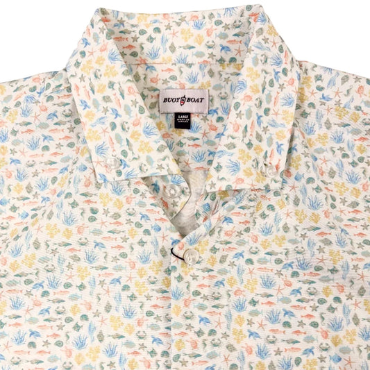 Marine life patterned shirt with a brand label on a white background