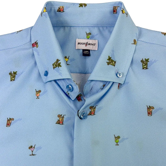 Light blue shirt with small embroidered patterns on a beige background