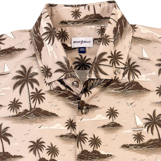 Beige shirt with tropical island and palm tree pattern on a white background