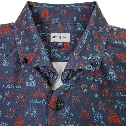 Navy blue shirt with red and white pattern featuring American symbols, brand label visible.