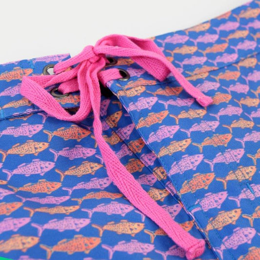 Tail to Tail boardshorts blue tail pattern detail close up