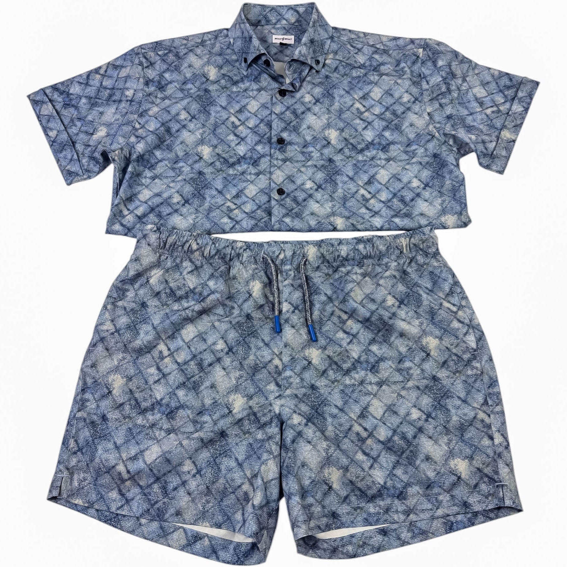Blue patterned shirt and shorts set on a white background