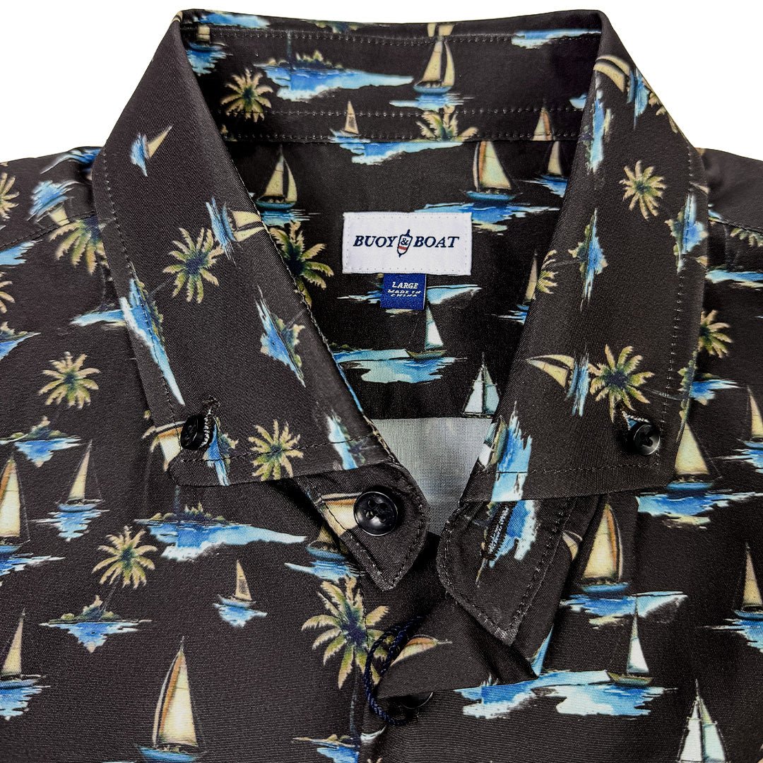 Black button up woven shirt with sail boats and palm trees