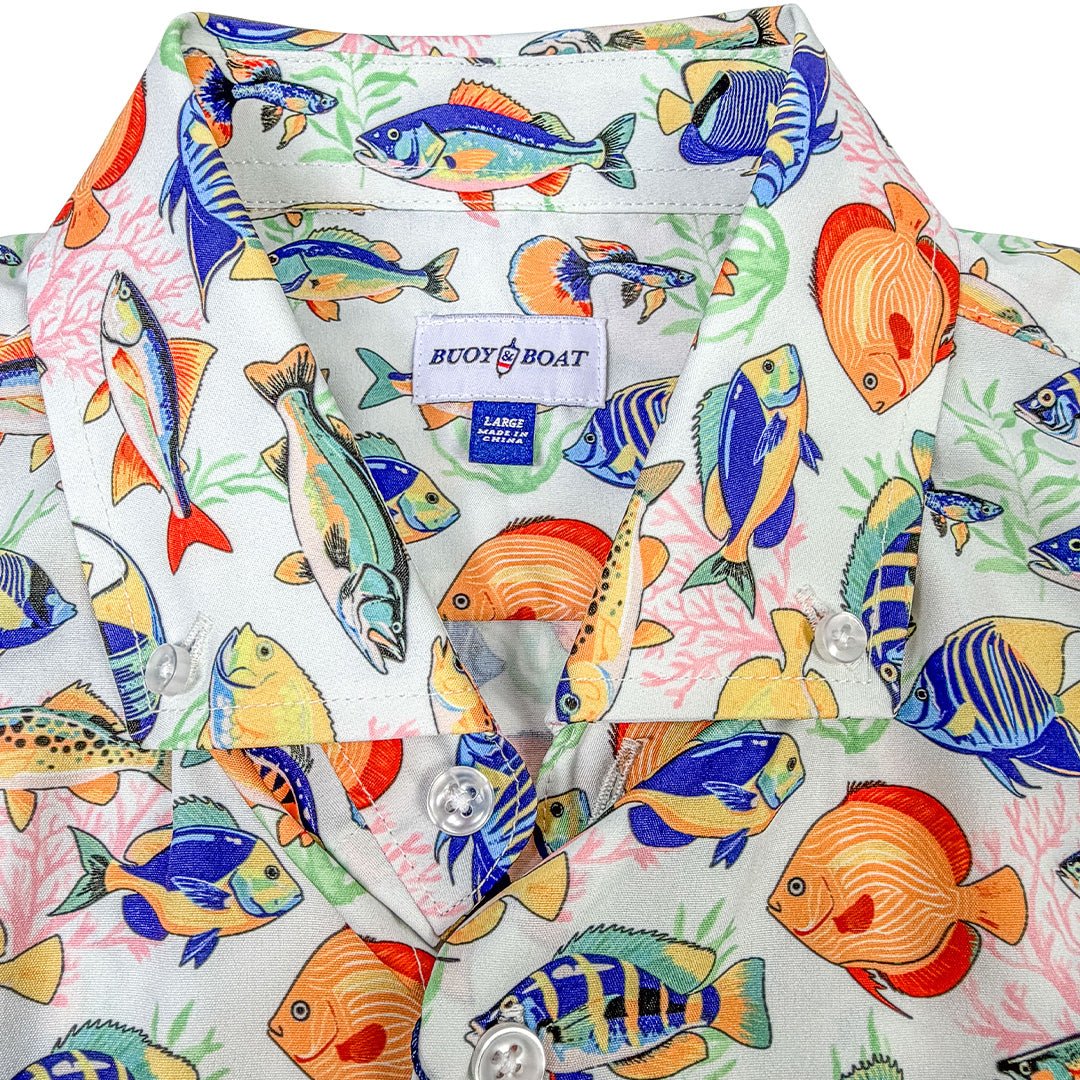 Shirt with colorful fish pattern and ' buoy & boat' label