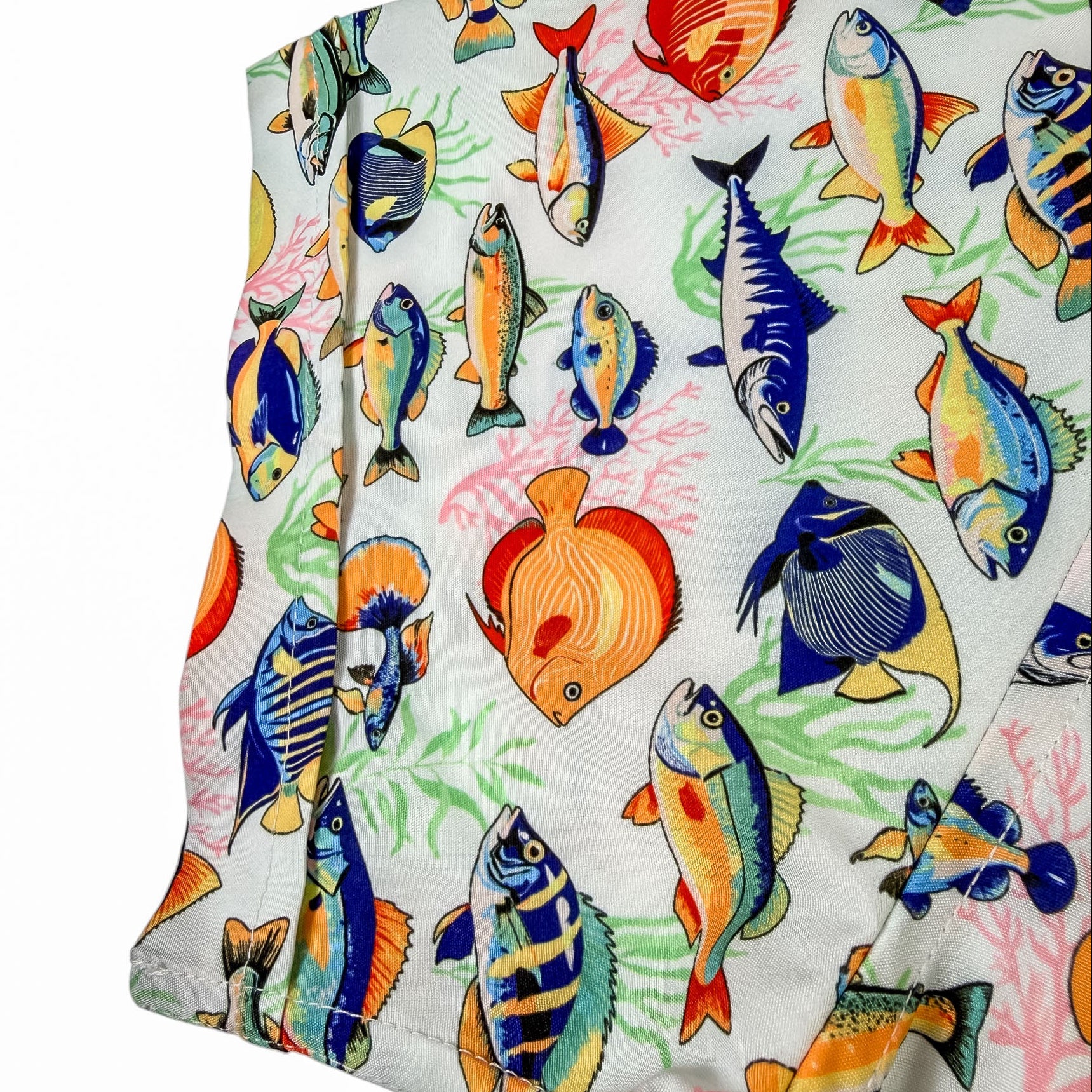 Shirt sleeve with colorful fish pattern on a white background