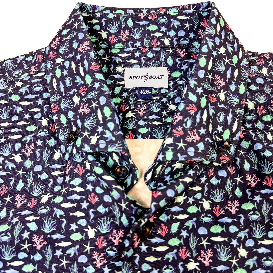 Dark Navy Button up woven shirt with multi colored marine life graphics