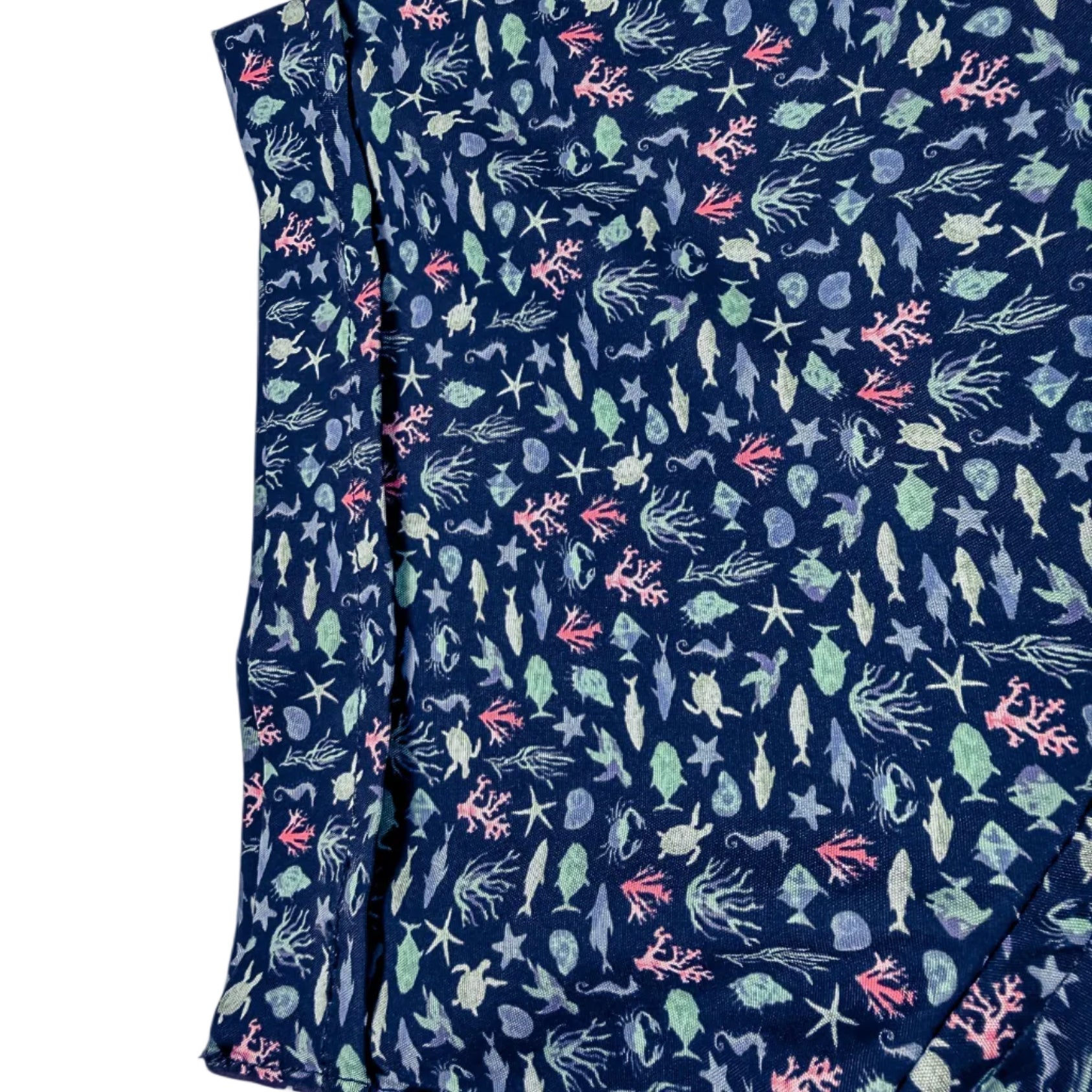 Navy blue fabric with colorful sea creature pattern on a white background