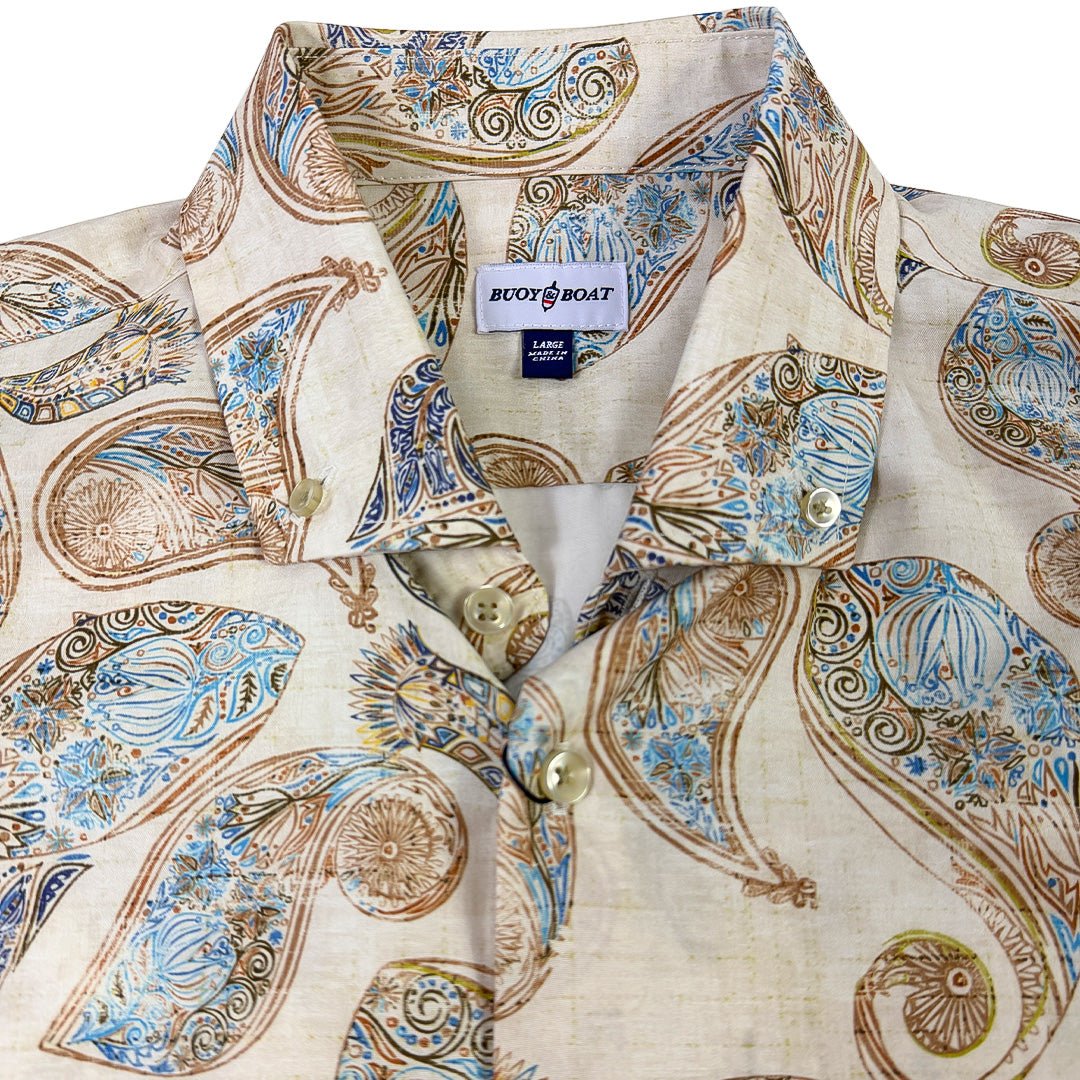 Patterned shirt with a visible brand label on a white background