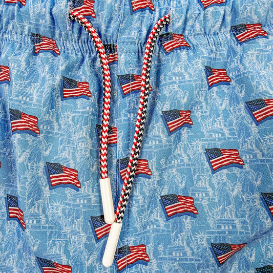 Blue fabric with American flag pattern and a jump rope on top