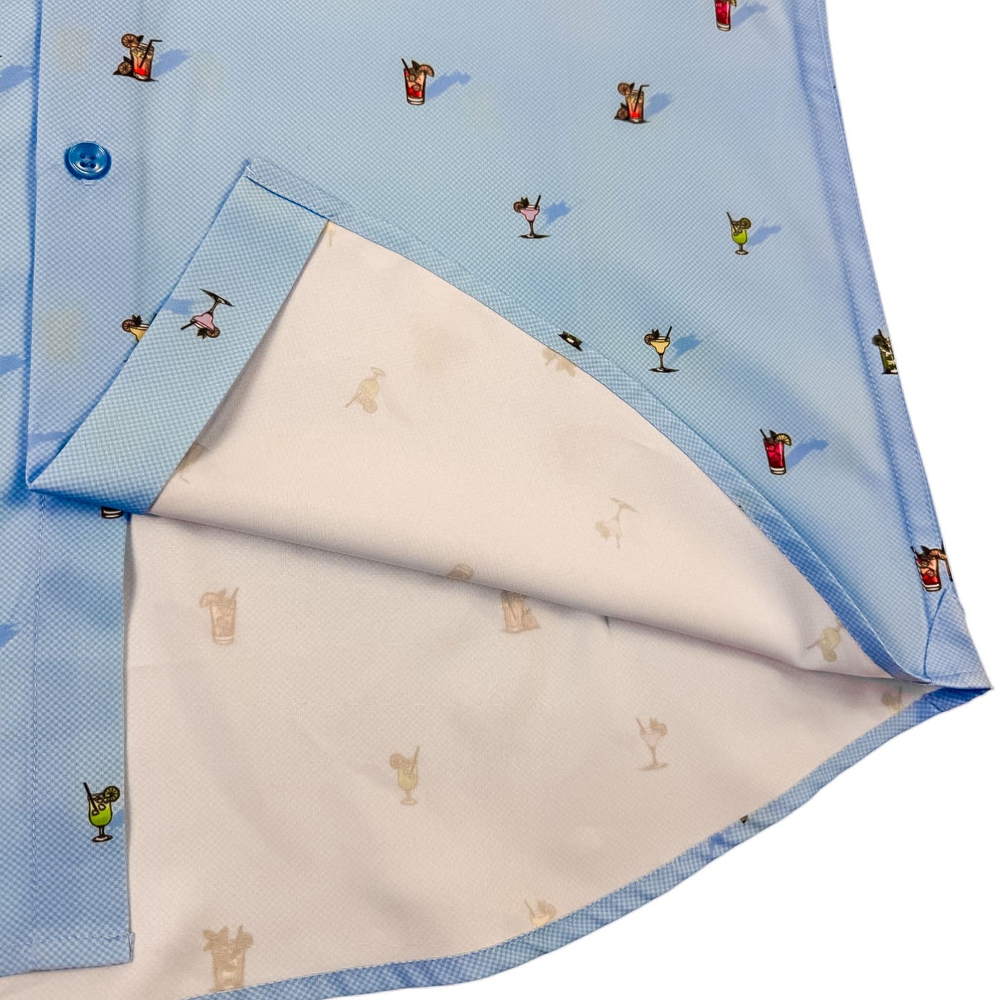 Light blue Shirt with cocktail glass  pattern on a white background