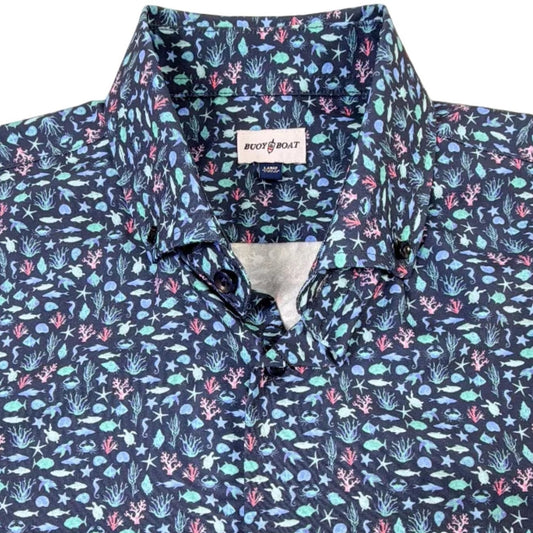 Blue patterned shirt with a brand label on a white background
