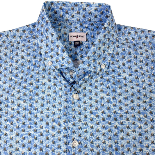 Blue patterned shirt with a collar on a beige background
