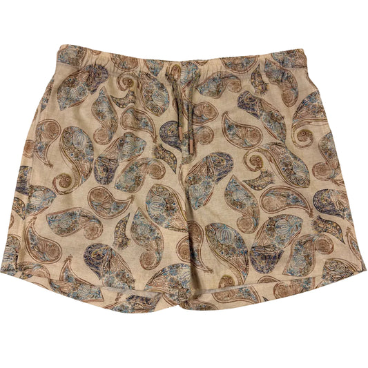 Paisley patterned shorts on a white background