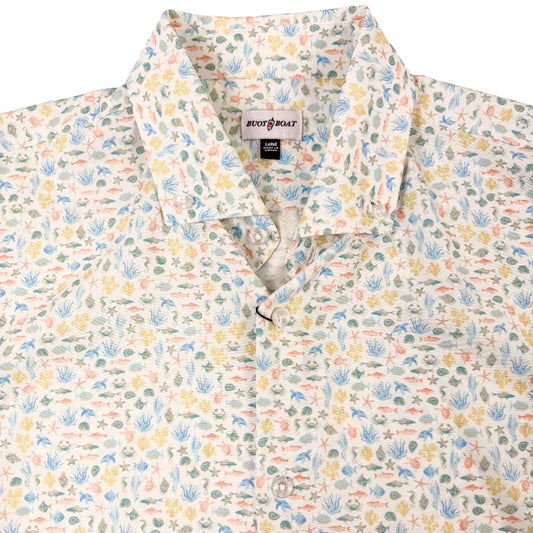 Marine life patterned shirt with a brand label on a white background