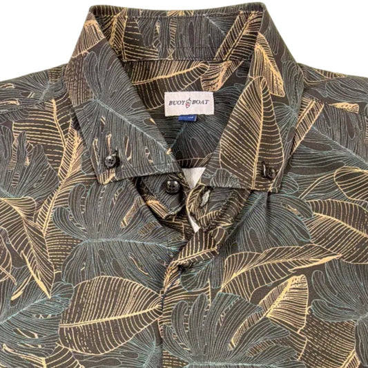 Floral patterned shirt on a hanger against a white wall