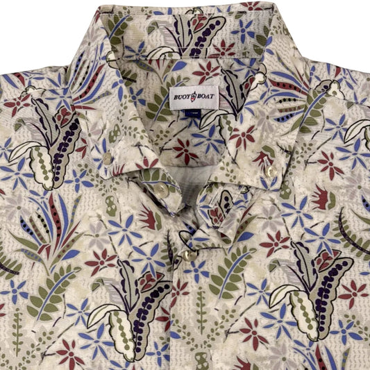 Floral patterned shirt with a brand label on a white background