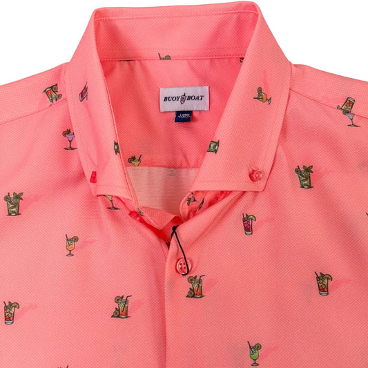 Pink shirt with small graphic patterns on a light gray background
