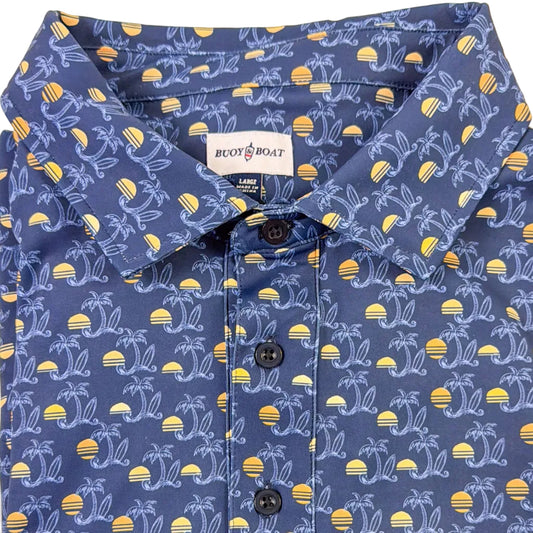 Folded blue polo shirt with yellow pattern on a beige background
