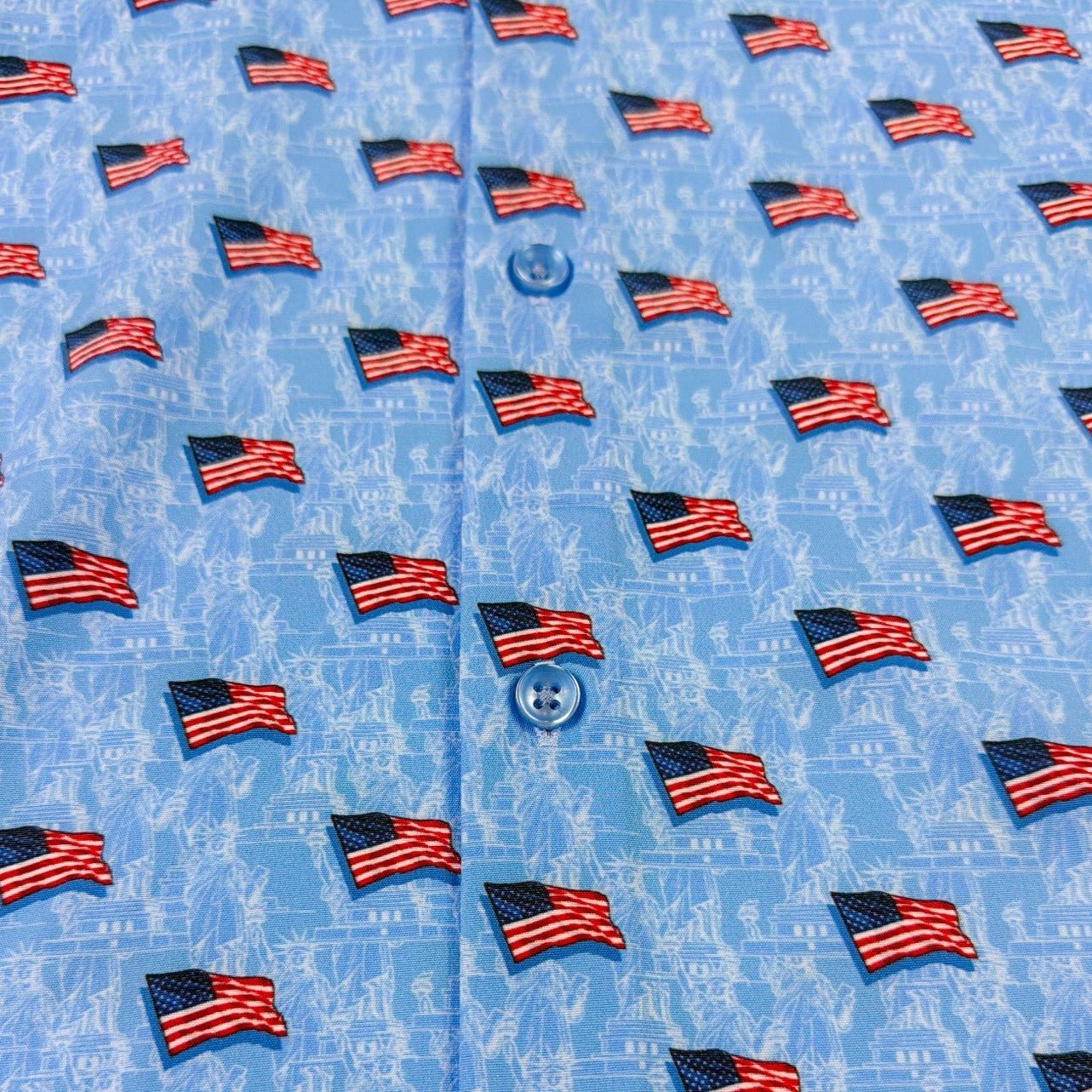 Blue shirt with small American flag pattern
