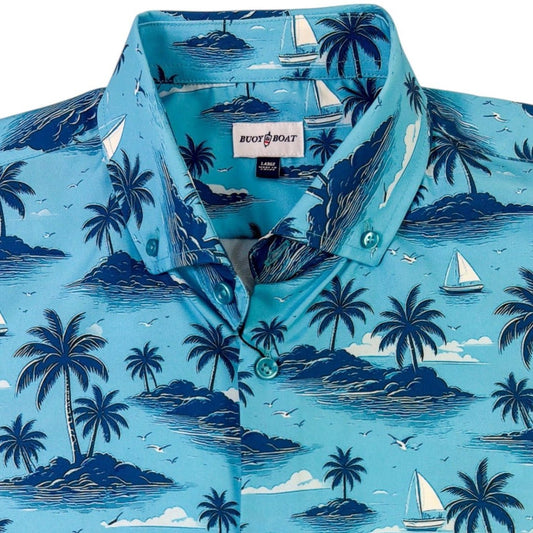 Blue shirt with tropical island and palm tree pattern on a white background