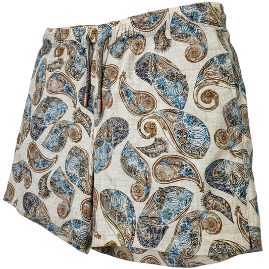 Paisley patterned shorts on a white background