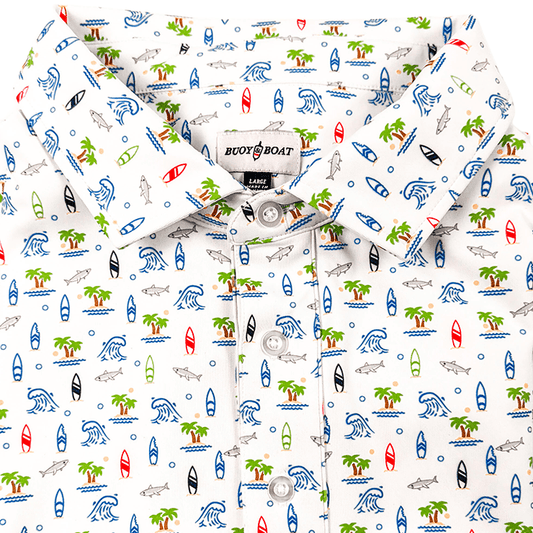 White shirt with colorful beach-themed pattern on a white background