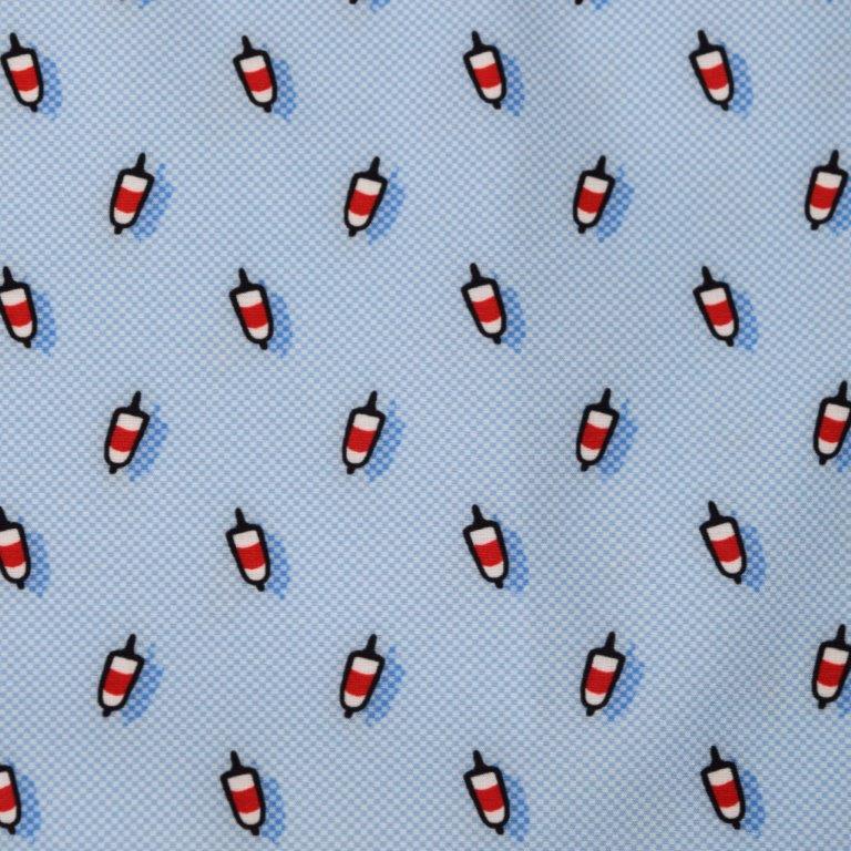 Buoys swim trunks blue nautical buoys pattern detail close up